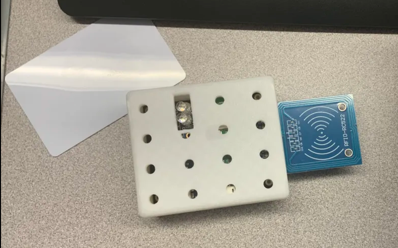 Image of NFC Device in case and a NFC card